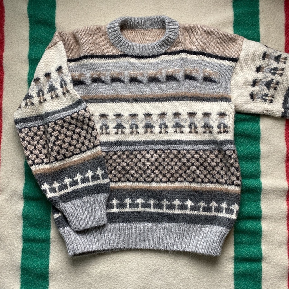 Hand knit, 100% wool sweater.